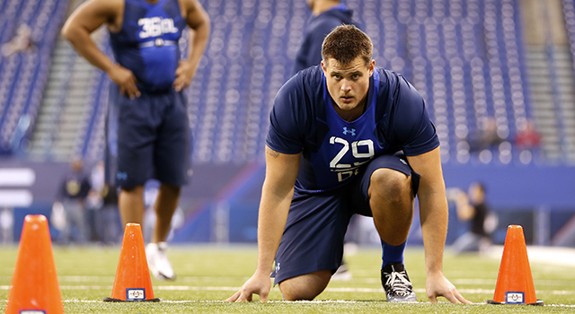 Wisconsin offensive lineman Rob Havenstein runs a drill at the NFL football scouting combine in Indianapolis, Friday, Feb. 20, 2015. (AP Photo/Julio Cortez)