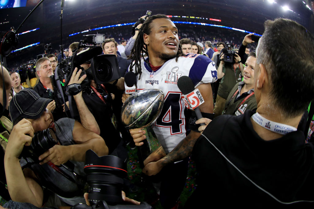 HOUSTON, TX - FEBRUARY 05: Dont'a Hightower #54 of the New England Patriots holds the Vince Lombardi Trophy after defeating the Atlanta Falcons 34-28 in overtime during Super Bowl 51 at NRG Stadium on February 5, 2017 in Houston, Texas.