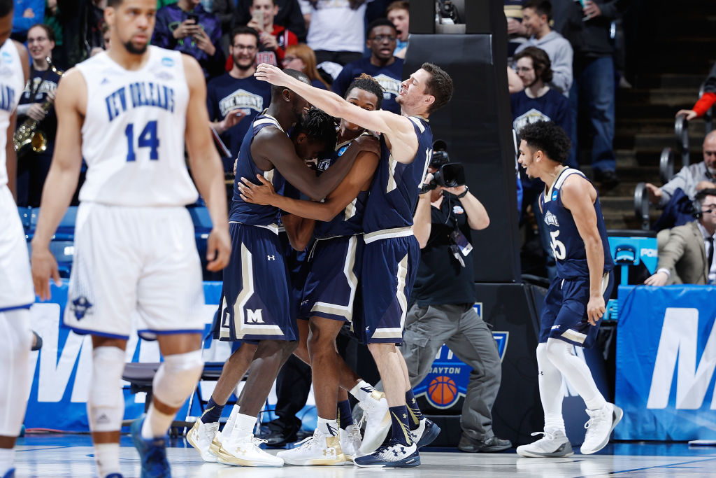DAYTON, OH - MARCH 14: The Mount St. Mary's Mountaineers celebrate defeating the New Orleans Privateers 67-66 in the First Four game during the 2017 NCAA Men's Basketball Tournament at UD Arena on March 14, 2017 in Dayton, Ohio.