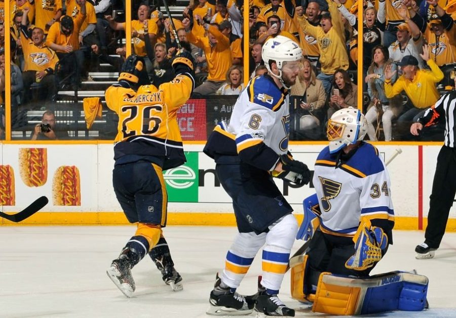 NASHVILLE, TN - APRIL 30: Harry Zolnierczyk #26 of the Nashville Predators celebrates as Joel Edmundson #6 and Jake Allen #34 of the St. Louis Blues react after a goal against the Blues during the third period in Game Three of the Western Conference Second Round during the 2017 NHL Stanley Cup Playoffs at Bridgestone Arena on April 30, 2017 in Nashville, Tennessee