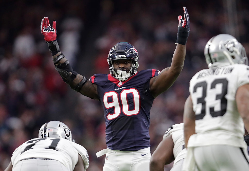 HOUSTON, TX - JANUARY 07: Jadeveon Clowney #90 of the Houston Texans lines up against the Oakland Raiders during the first half of their AFC Wild Card game at NRG Stadium on January 7, 2017 in Houston, Texas.