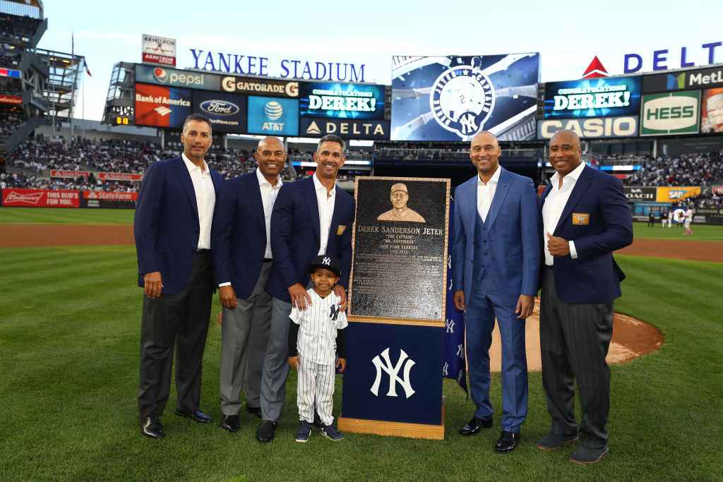 NEW YORK, NY - MAY 14: Derek Jeter poses with his former teamates Andy Pettitte, Mariano Rivera, Jorge Posada, and Bernie Williams during the retirement ceremony of his number 2 jersey at Yankee Stadium on May 14, 2017 in New York City.
