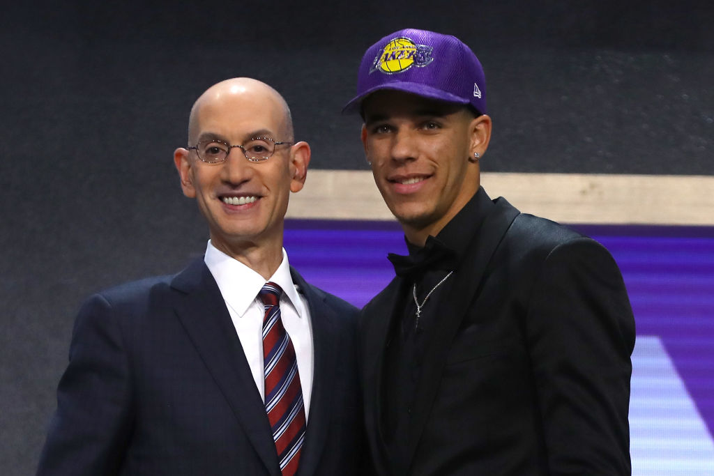 NEW YORK, NY - JUNE 22: Lonzo Ball walks on stage with NBA commissioner Adam Silver after being drafted second overall by the Los Angeles Lakers during the first round of the 2017 NBA Draft at Barclays Center on June 22, 2017 in New York City