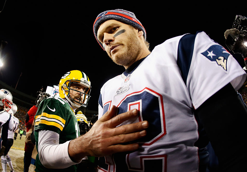 GREEN BAY, WI - NOVEMBER 30: Quarterback Tom Brady #12 of the New England Patriots walks away from Aaron Rodgers #12 of the Green Bay Packers after shaking hands following the NFL game at Lambeau Field on November 30, 2014 in Green Bay, Wisconsin. The Packers defeated the Patriots 26-21.
