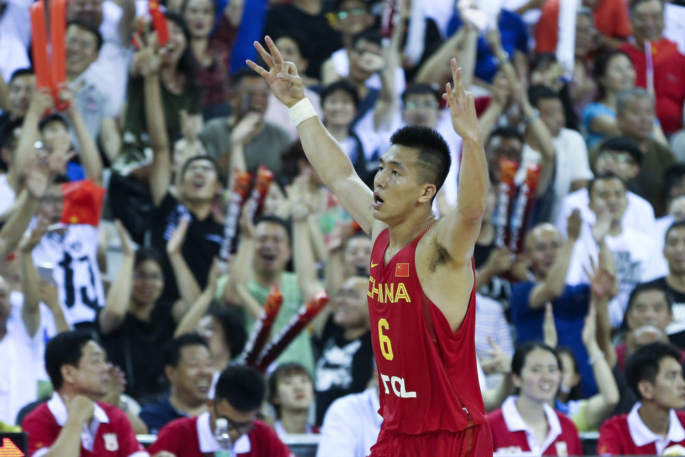 JILIN, CHINA - JULY 07: Guo Ailun of China celebrate his score during the 2017 Sino-Australia Men's International Basketball Challenge at Jilin stadium on July 7, 2017 in Jilin, China.