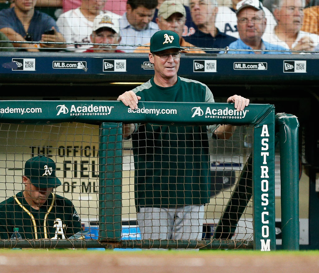 HOUSTON, TX - JUNE 29: Manager Bob Melvin #6 of the Oakland Athletics looks on from the dugout against the Houston Astros at Minute Maid Park on June 29, 2017 in Houston, Texas