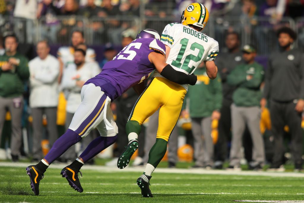 MINNEAPOLIS, MN - OCTOBER 15: Anthony Barr #55 of the Minnesota Vikings hits quarterback Aaron Rodgers #12 of the Green Bay Packers during the first quarter of the game on October 15, 2017 at US Bank Stadium in Minneapolis, Minnesota.