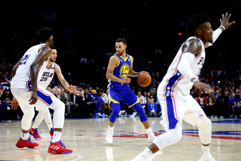 Stephen Curry #30 of the Golden State Warriors dribbles the ball against the Philadelphia 76ers in the second half at Wells Fargo Center on November 18, 2017 in Philadelphia,Pennsylvania