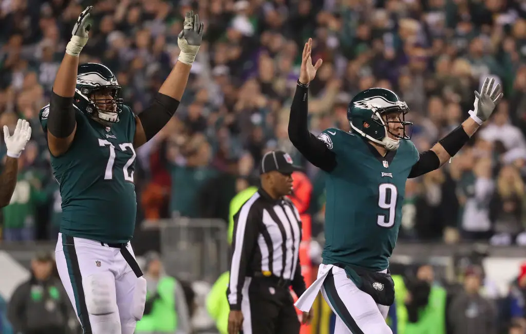 PHILADELPHIA, PA - JANUARY 21: Nick Foles #9 of the Philadelphia Eagles celebrates a first quarter touchdown against the Minnesota Vikings in the NFC Championship game at Lincoln Financial Field