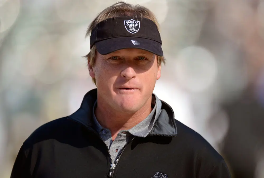 OAKLAND, CA - NOVEMBER 18: Former head coach of the Oakland Raiders and now ESPN Monday Night Football Analyst Jon Gruden looks on during pre-game warm ups before an NFL football game between the New Orleans Saints and Oakland Raiders at O.co Coliseum on November 18, 2012 in Oakland, California.