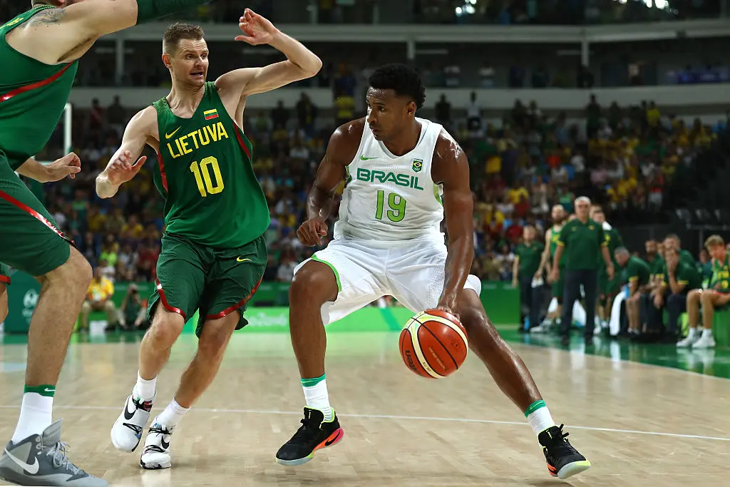 Leandro Barbosa of Brazil drives the ball against Renaldas Seibutis of Lithuania during a Men's preliminary round basketball game between Brazil and Lithuania on Day 2 of the Rio 2016 Olympic Games at Carioca Arena 1 on August 7, 2016 in Rio de Janeiro, Brazil.
