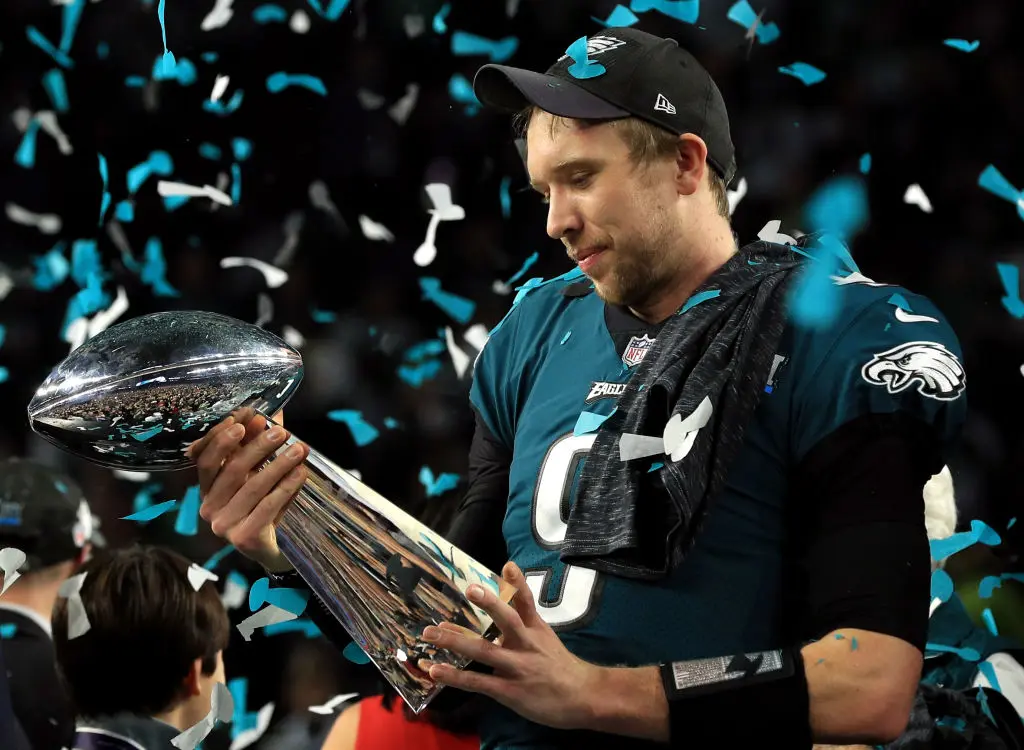 Nick Foles #9 of the Philadelphia Eagles celebrates with the Lombardi Trophy after defeating the New England Patriots 41-33 in Super Bowl LII at U.S. Bank Stadium on February 4, 2018 in Minneapolis, Minnesota.