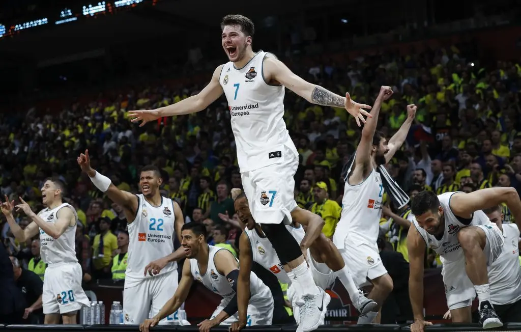 BELGRADE, SERBIA - MAY 20: Luka Doncic (C) of Real Madric celebrates victory after the Turkish Airlines Euroleague Final Four Belgrade 2018 Final match between Real Madrid and Fenerbahce Istanbul Dogus at Stark Arena on May 20, 2018 in Belgrade, Serbia. 