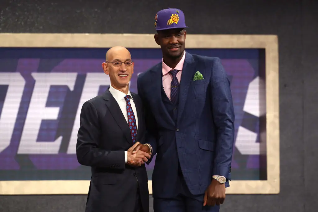 NEW YORK, NY - JUNE 21: Deandre Ayton poses with NBA Commissioner Adam Silver after being drafted first overall by the Phoenix Suns during the 2018 NBA Draft at the Barclays Center on June 21, 2018 in the Brooklyn borough of New York