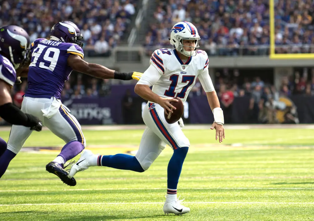 MINNEAPOLIS, MN - SEPTEMBER 23: Josh Allen #17 of the Buffalo Bills runs with the ball before diving for a touchdown in the first quarter of the game against the Minnesota Vikings at U.S. Bank Stadium on September 23, 2018 in Minneapolis, Minnesota