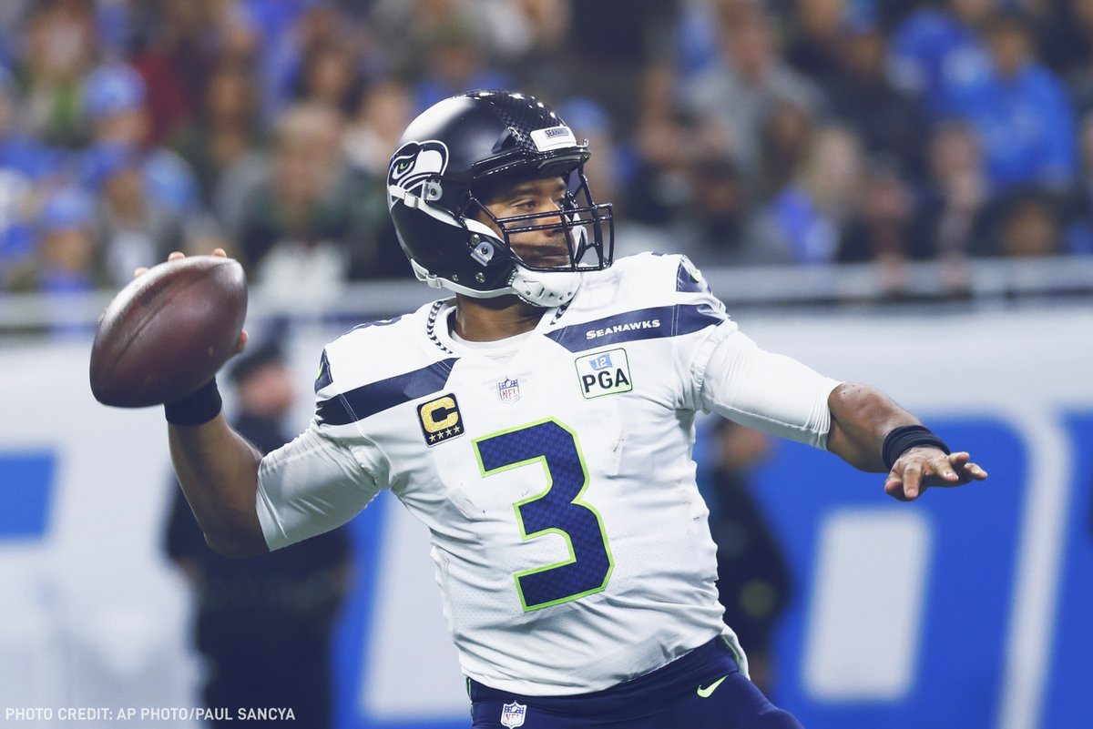 Quarterback do Seattle Seahawks Russell Wilson em ação na vitória sobre o Detroit Lions na semana 8 da NFL 2018