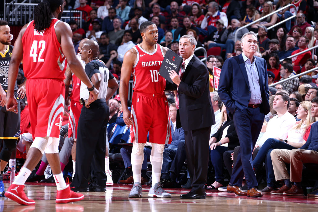HOUSTON, TX - JANUARY 20: Assistant Coach Jeff Bzdelik of the Houston Rockets speaks with Eric Gordon #10 and Nene Hilario #42 of the Houston Rockets during the game against the Golden State Warriors on January 20, 2018 at the Toyota Center in Houston, Texas. NOTE TO USER: User expressly acknowledges and agrees that, by downloading and or using this photograph, User is consenting to the terms and conditions of the Getty Images License Agreement. Mandatory Copyright Notice: Copyright 2018 NBAE