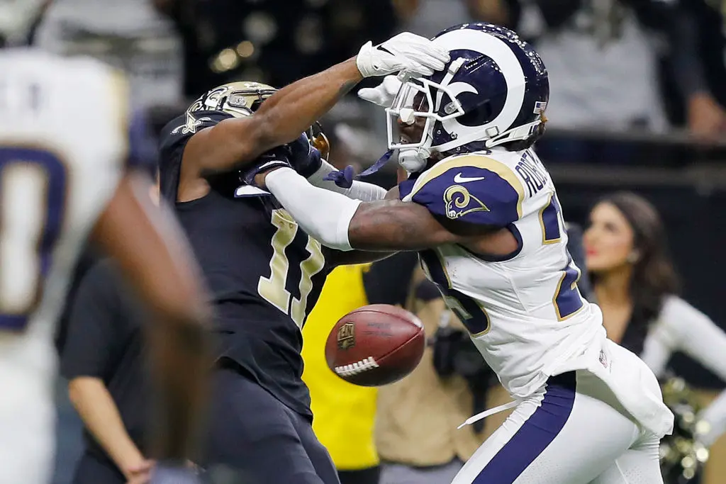 NEW ORLEANS, LOUISIANA - JANUARY 20: Tommylee Lewis #11 of the New Orleans Saints drops a pass broken up by Nickell Robey-Coleman #23 of the Los Angeles Rams during the fourth quarter in the NFC Championship game at the Mercedes-Benz Superdome on January 20, 2019 in New Orleans, Louisiana