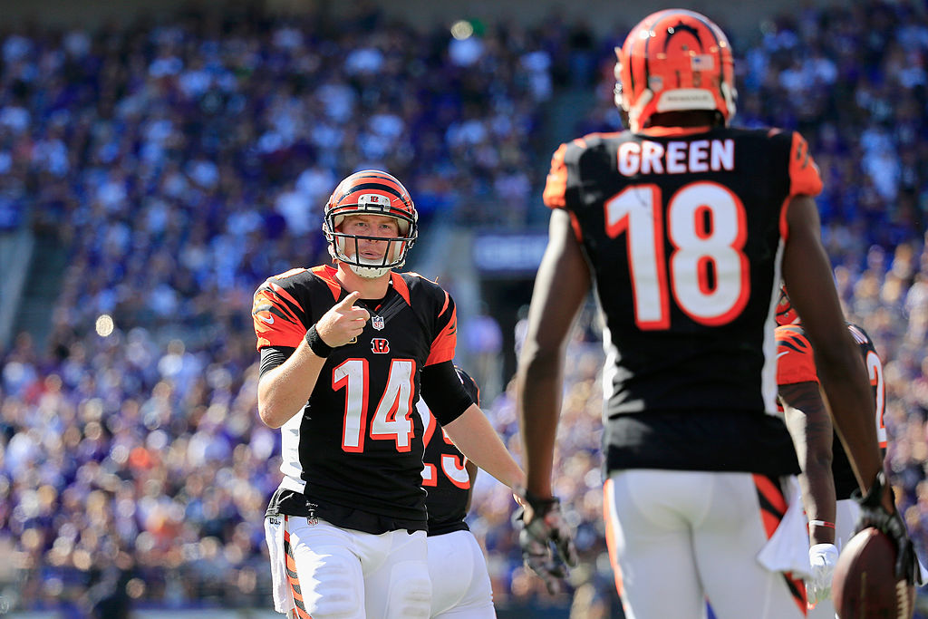 BALTIMORE, MD - SEPTEMBER 07: Quarterback Andy Dalton #14 of the Cincinnati Bengals celebrates with wide receiver A.J. Green #18 after Green's game winning touchdown during an NFL football game against the Baltimore Ravens at M&T Bank Stadium on September 7, 2014 in Baltimore, Maryland.