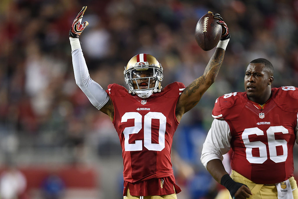 SANTA CLARA, CA - OCTOBER 22: Kenneth Acker #20 of the San Francisco 49ers celebrates after intercepting a pass by Russell Wilson #3 of the Seattle Seahawks in the third quarter of their NFL game at Levi's Stadium on October 22, 2015 in Santa Clara, California. (Photo by Thearon W. Henderson/Getty Images)