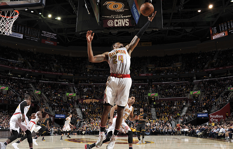 CLEVELAND, OH - NOVEMBER 8: Kent Bazemore #24 of the Atlanta Hawks grabs the rebound against the Cleveland Cavaliers on November 8, 2016 at The Quicken Loans Arena in Cleveland, Ohio. NOTE TO USER: User expressly acknowledges and agrees that, by downloading and/or using this Photograph, user is consenting to the terms and conditions of the Getty Images License Agreement. Mandatory Copyright Notice: Copyright 2016 NBAE 