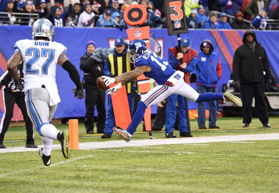 Odell Beckham Jr. anotando um touchdown na vitória dos Giants sobre os Lions na Semana 15