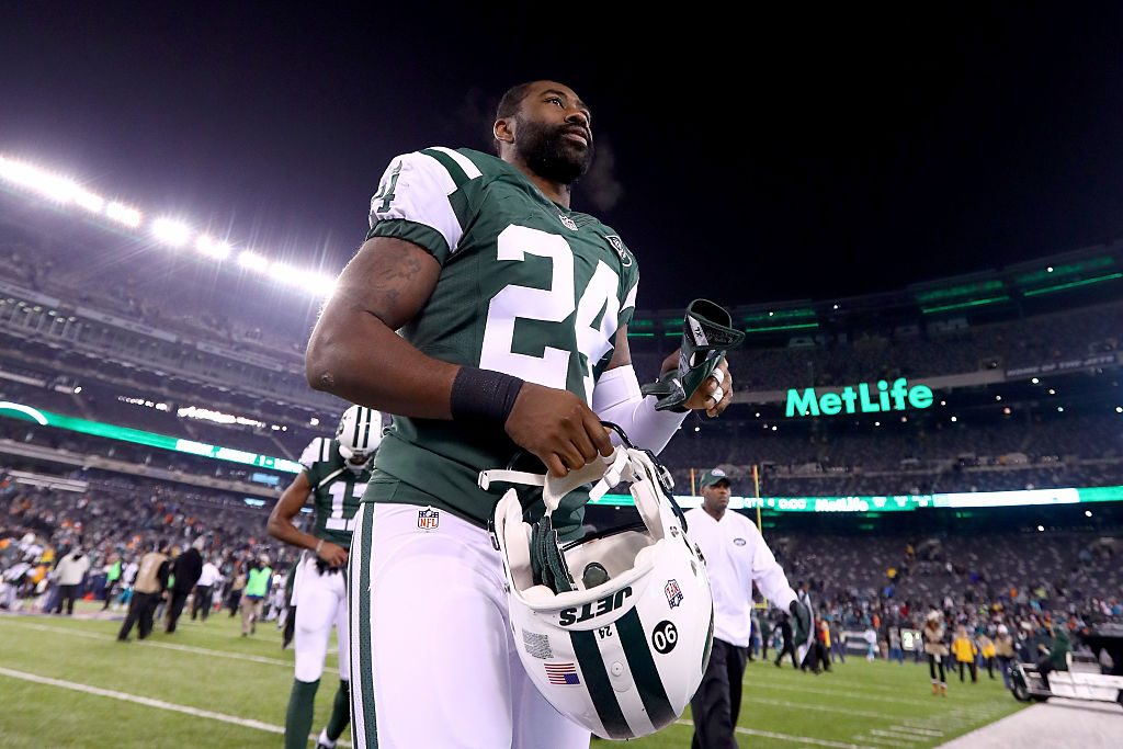 EAST RUTHERFORD, NJ - DECEMBER 17: Darrelle Revis #24 of the New York Jets walks off the field after being defeated by the Miami Dolphins with a score of 34 to 13 at MetLife Stadium on December 17, 2016 in East Rutherford, New Jersey.