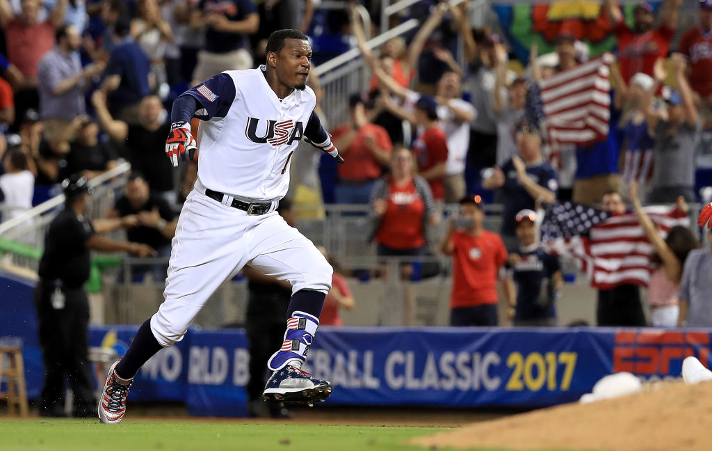MIAMI, FL - MARCH 10: Adam Jones #10 of the United States celebrates a walk off RBI single in the 10th inning during a Pool C game of the 2017 World Baseball Classic against Comubia at Miami Marlins Stadium on March 10, 2017 in Miami, Florida. 