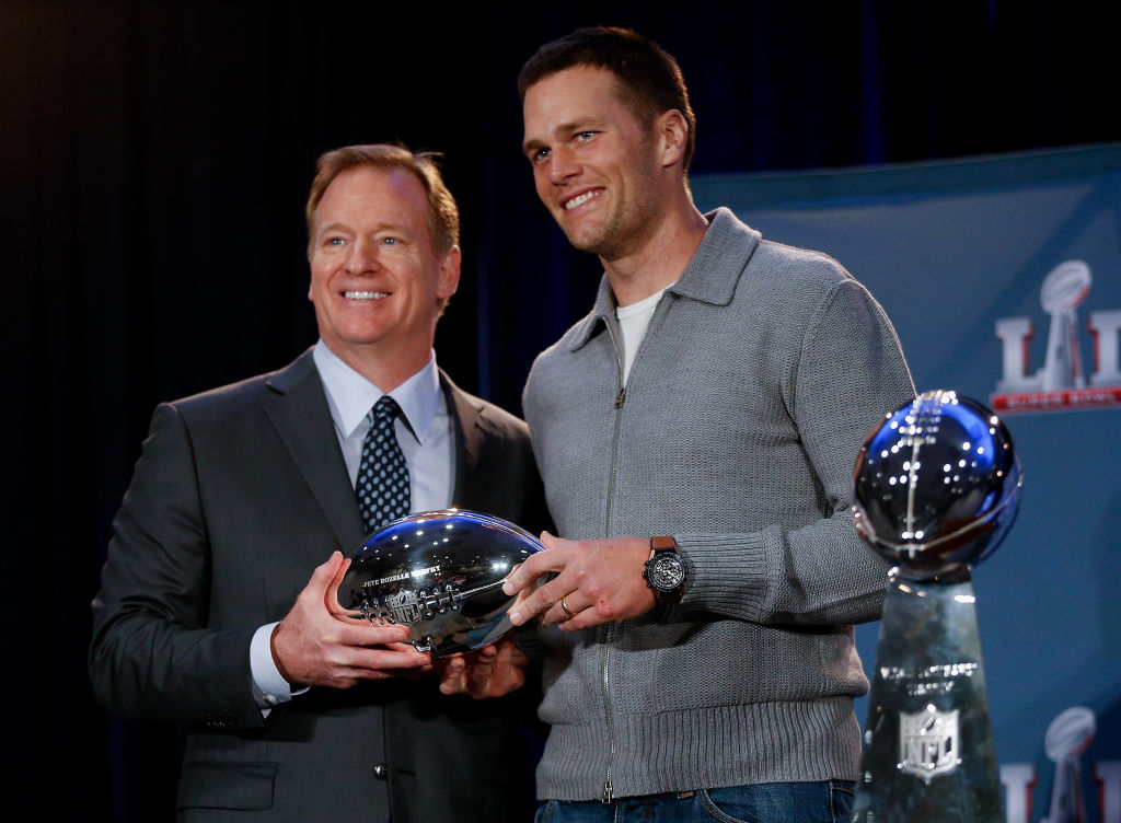 HOUSTON, TX - FEBRUARY 06: NFL Commissioner Roger Goodell, left, and New England Patriots' Tom Brady with the Pete Rozelle MVP Trophy during the Super Bowl Winner and MVP press conference on February 6, 2017 in Houston, Texas.