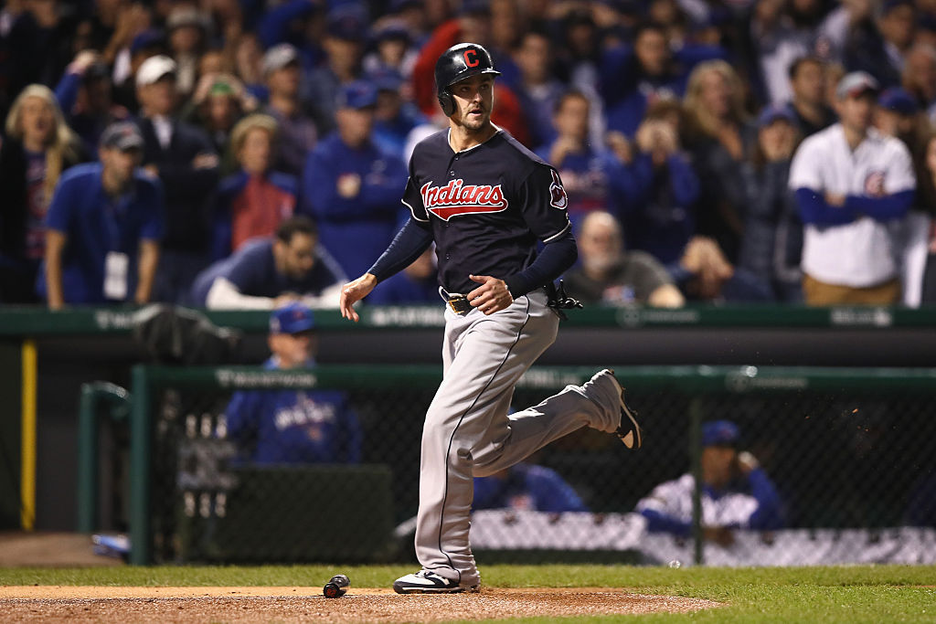 CHICAGO, IL - OCTOBER 29:  Lonnie Chisenhall #8 of the Cleveland Indians runs to home plate to score a run in the second inning against the Chicago Cubs in Game Four of the 2016 World Series at Wrigley Field on October 29, 2016 in Chicago, Illinois.