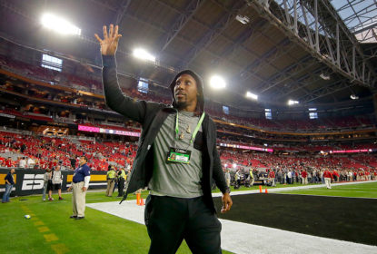 GLENDALE, AZ - JANUARY 11: NFL Player Roddy White #84 of the Atlanta Falcons waves to the crowd prior to the 2016 College Football Playoff National Championship Game between the Alabama Crimson Tide and the Clemson Tigers at University of Phoenix Stadium on January 11, 2016 in Glendale, Arizona.