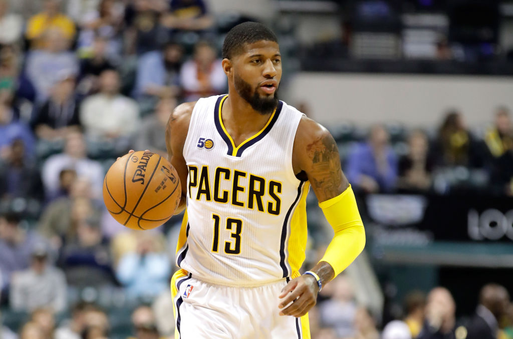 INDIANAPOLIS, IN - MARCH 15: Paul George #13 of the Indiana Pacers dribbles the ball during the game against the Charlotte Hornets at Bankers Life Fieldhouse on March 15, 2017 in Indianapolis, Indiana