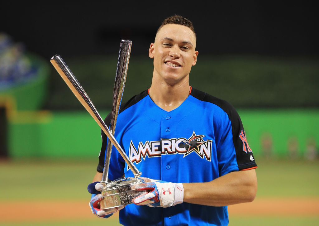MIAMI, FL - JULY 10: Aaron Judge #99 of the New York Yankees celebrates with the trophy after winning the T-Mobile Home Run Derby at Marlins Park on July 10, 2017 in Miami, Florida.