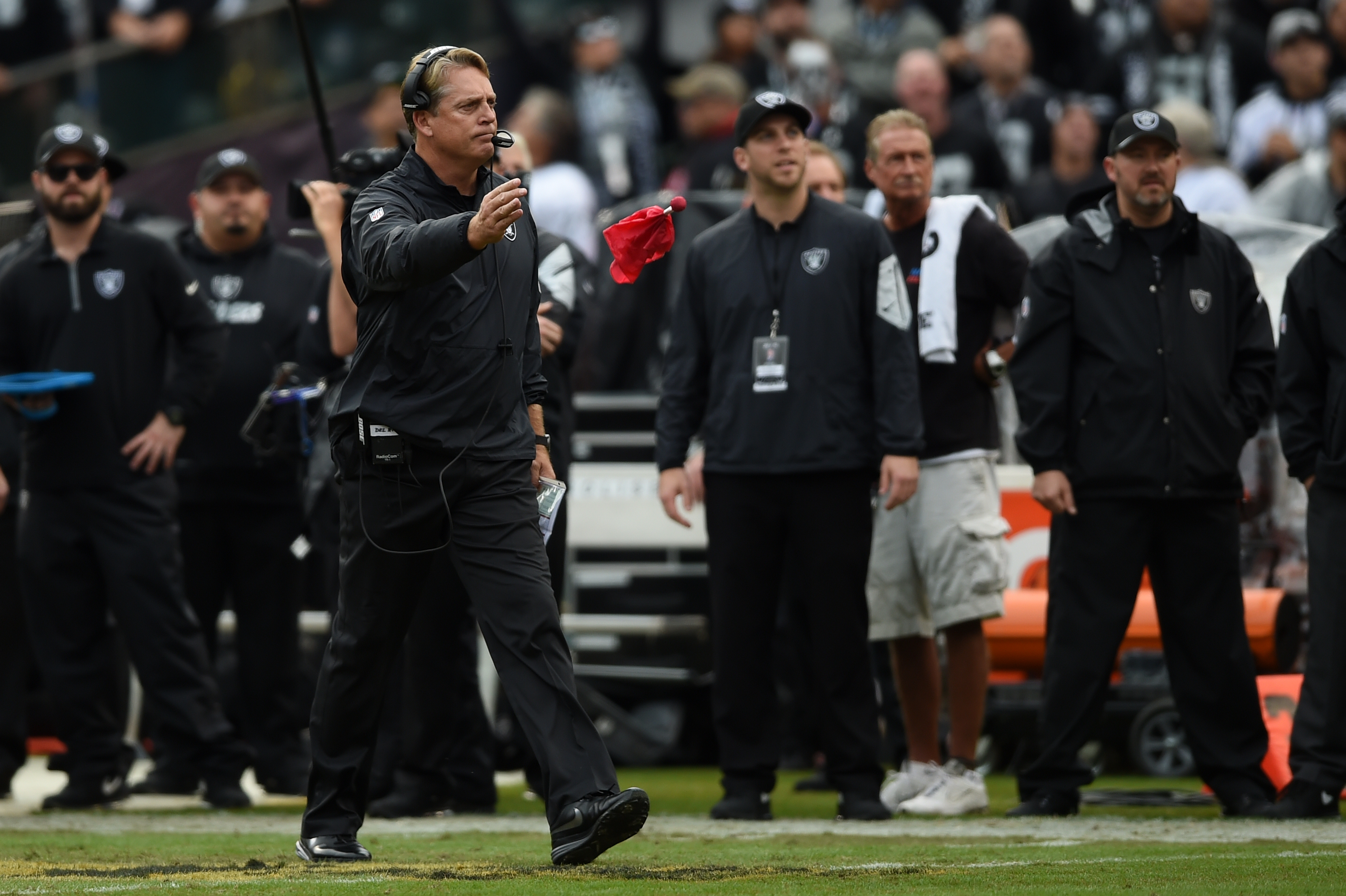 OAKLAND, CA - DECEMBER 06: Head coach Jack Del Rio of the Oakland Raiders throws his challenge flag after Latavius Murray #28 was called short of the goal line during their NFL game against the Kansas City Chiefs at O.co Coliseum on December 6, 2015 in Oakland, California. The ruling was overturned for an Oakland Raiders touchdown. 