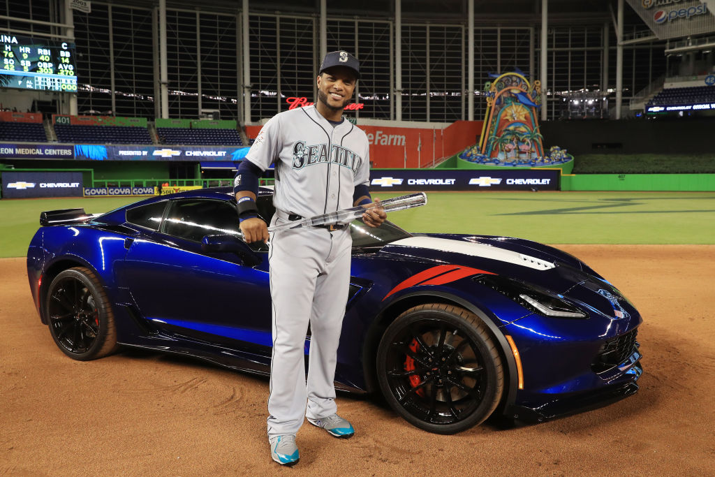 MIAMI, FL - JULY 11: Robinson Cano #22 of the Seattle Mariners and the American League celebrates with the Major League Baseball All-Star Game Most Valuable Player Award after they defeated the National League 2 to 1 during the 88th MLB All-Star Game at Marlins Park on July 11, 2017 in Miami, Florida.