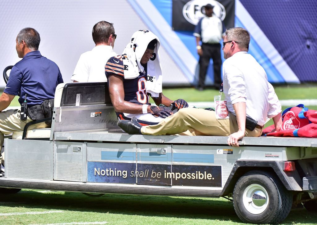 NASHVILLE, TN - AUGUST 27: Cameron Meredith #81 of the Chicago Bears is carted off the field after being injured by a tackled by the Tennessee Titans during the first half at Nissan Stadium on August 27, 2017 in Nashville, Tennessee. 