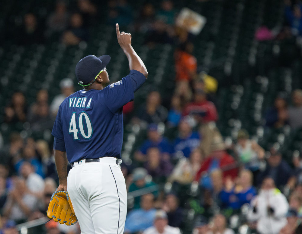 SEATTLE, WA - AUGUST 14: Thyago Vieira #40 walks off the field after going 1-2-3 in the top of the ninth inning during his major league debut against the Baltimore Orioles of the Seattle Mariners at Safeco Field on August 14, 2017 in Seattle, Washington.