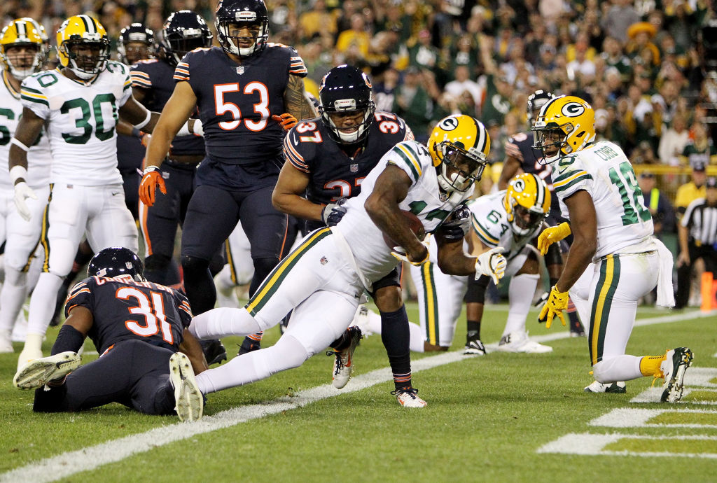 GREEN BAY, WI - SEPTEMBER 28: Davante Adams #17 of the Green Bay Packers scores a touchdown in the first quarter against the Chicago Bears at Lambeau Field on September 28, 2017 in Green Bay, Wisconsin. 