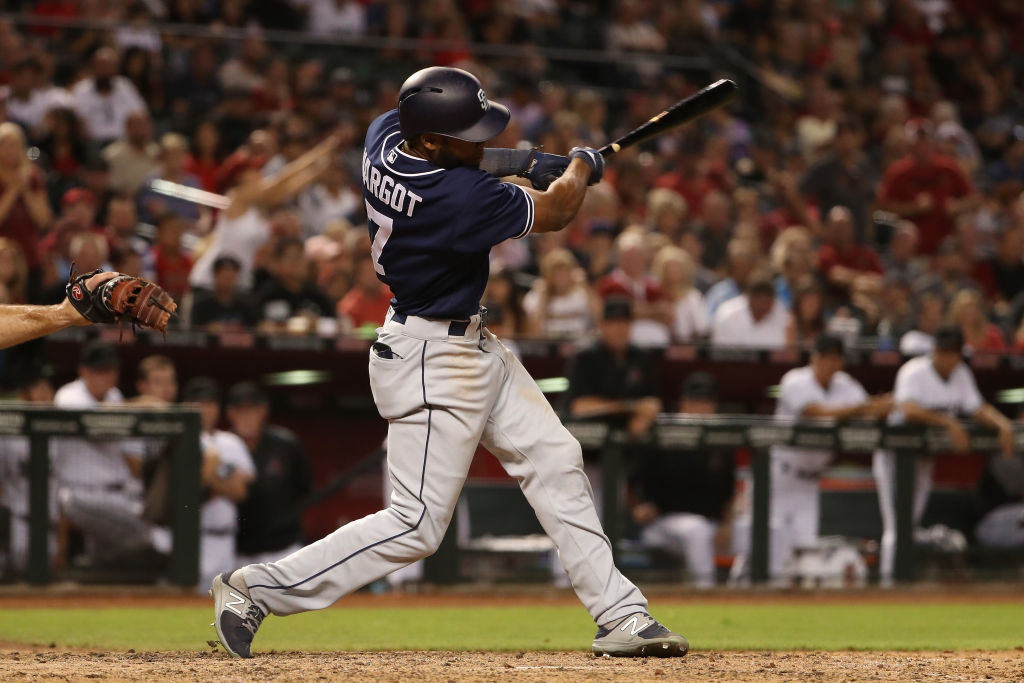 Manuel Margot #7 of the San Diego Padres hits a two RBI single against the Arizona Diamondbacks during the seventh inning of the MLB game at Chase Field on September 8, 2017 in Phoenix, Arizona.