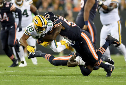 GREEN BAY, WI - SEPTEMBER 28: Randall Cobb #18 of the Green Bay Packers is tackled by Danny Trevathan #59 of the Chicago Bears in the first quarter at Lambeau Field on September 28, 2017 in Green Bay, Wisconsin.