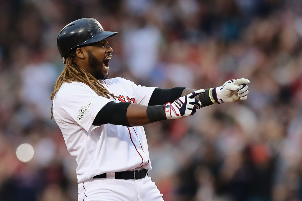BOSTON, MA - OCTOBER 08: Hanley Ramirez #13 of the Boston Red Sox celebrates after hitting a two-run RBI double in the seventh inning against the Houston Astros during game three of the American League Division Series at Fenway Park on October 8, 2017 in Boston, Massachusetts.