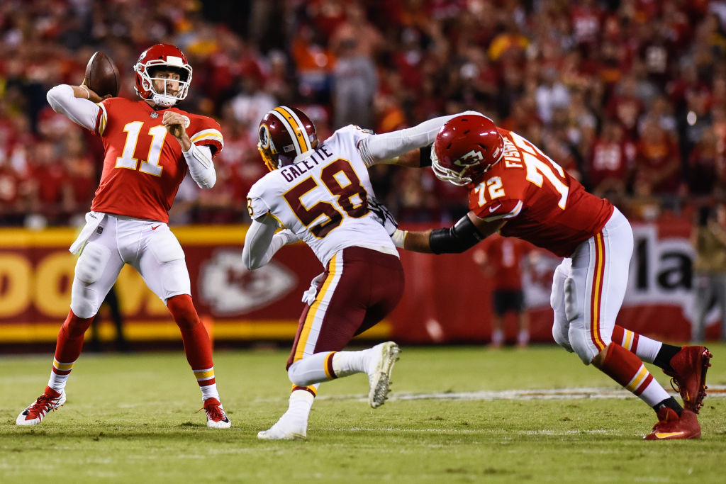 KANSAS CITY, MO - OCTOBER 2: Quarterback Alex Smith #11 of the Kansas City Chiefs throws a pass in front of the oncoming rush from linebacker Junior Galette #58 of the Washington Redskins during the second quarter at Arrowhead Stadium on October 2, 2017 in Kansas City, Missouri.