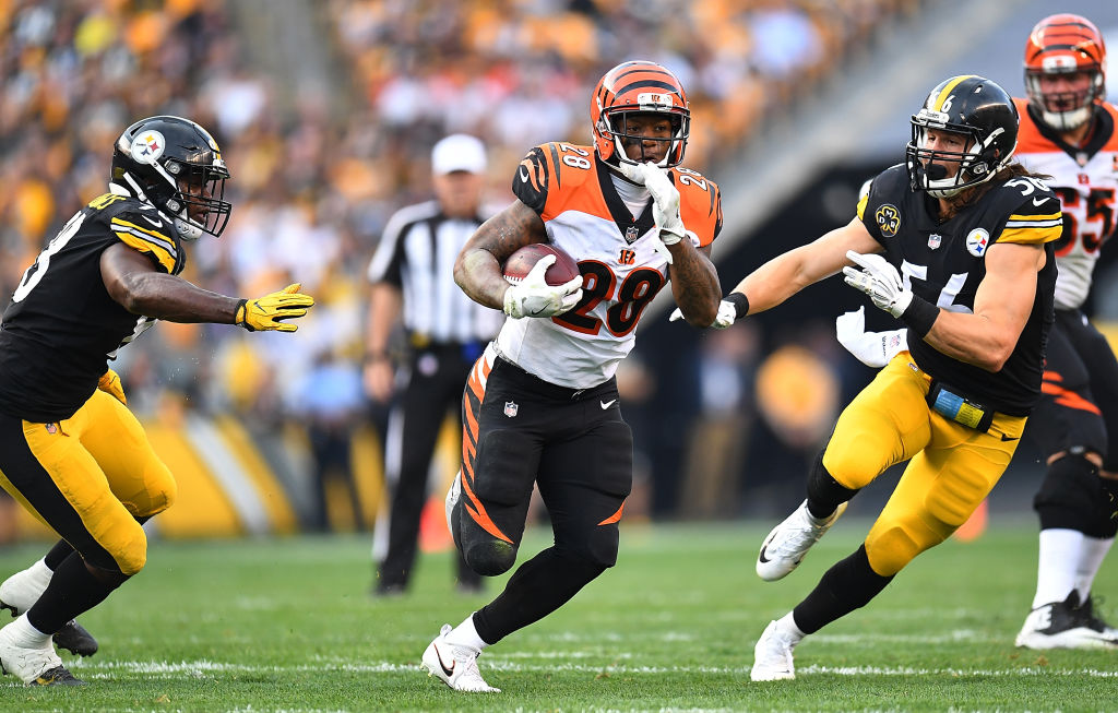 PITTSBURGH, PA - OCTOBER 22: Joe Mixon #28 of the Cincinnati Bengals carries the ball against the Pittsburgh Steelers in the first half during the game at Heinz Field on October 22, 2017 in Pittsburgh, Pennsylvania.
