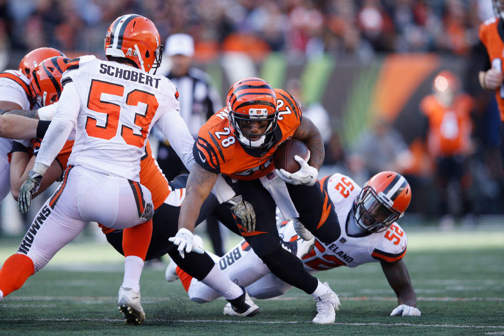 CINCINNATI, OH - NOVEMBER 26: Joe Mixon #28 of the Cincinnati Bengals runs the ball in the first half of a game against the Cleveland Browns at Paul Brown Stadium on November 26, 2017 in Cincinnati, Ohio. The Bengals won 30-16.