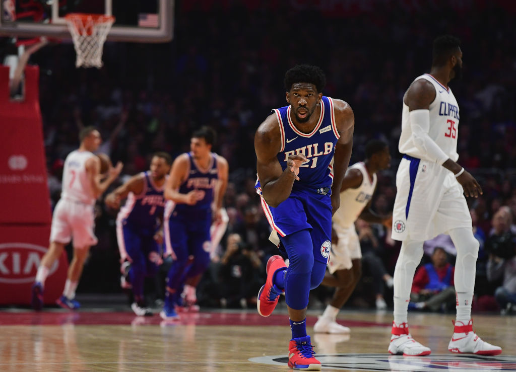 Joel Embiid #21 of the Philadelphia 76ers reacts to his three pointer during the first half against the LA Clippers at Staples Center on November 13, 2017 in Los Angeles, California.