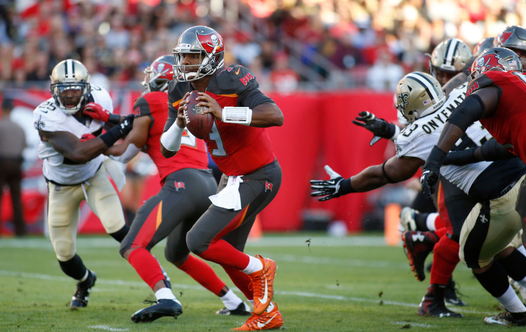 TAMPA, FL - DECEMBER 31: Quarterback Jameis Winston #3 of the Tampa Bay Buccaneers runs for 17 yards during the first quarter of an NFL football game against the New Orleans Saints on December 31, 2017 at Raymond James Stadium in Tampa, Florida. 