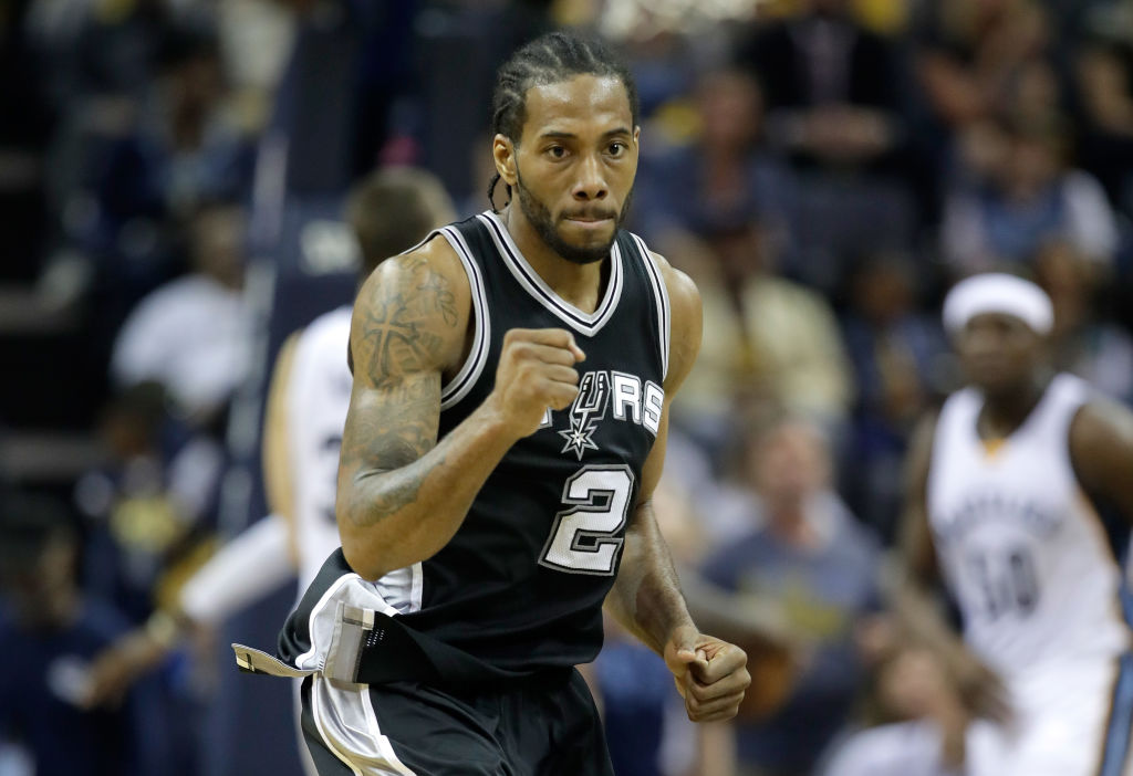 MEMPHIS, TN - APRIL 22: Kawhi Leonard #2 of the San Antonio Spurs pumps his fist after making a three point shot against the Memphis Grizzlies in game four of the Western Conference Quarterfinals during the 2017 NBA Playoffs at FedExForum on April 22, 2017 in Memphis, Tennessee.