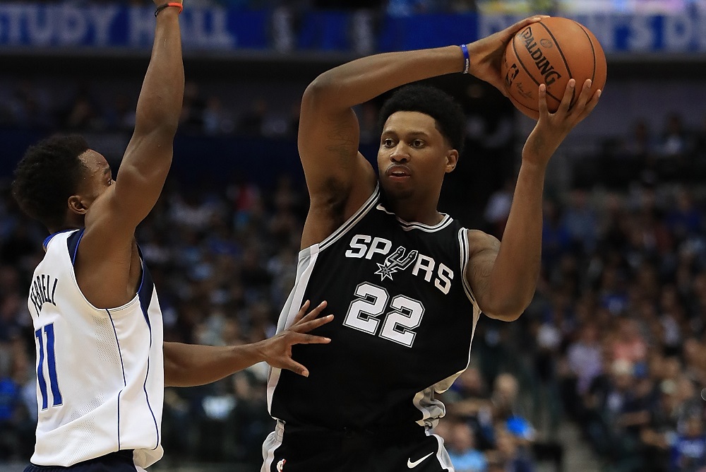 DALLAS, TX - NOVEMBER 14: Rudy Gay #22 of the San Antonio Spurs passes the ball against Yogi Ferrell #11 of the Dallas Mavericks in the first half at American Airlines Center on November 14, 2017 in Dallas, Texas