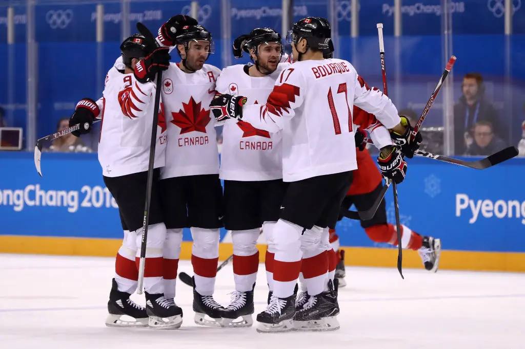 GANGNEUNG, SOUTH KOREA - FEBRUARY 15: Team Canada celebrates after scoring against Switzerland during the Men's Ice Hockey Preliminary Round Group A game on day six of the PyeongChang 2018 Winter Olympic Games at Kwandong Hockey Centre on February 15, 2018 in Gangneung, South Korea