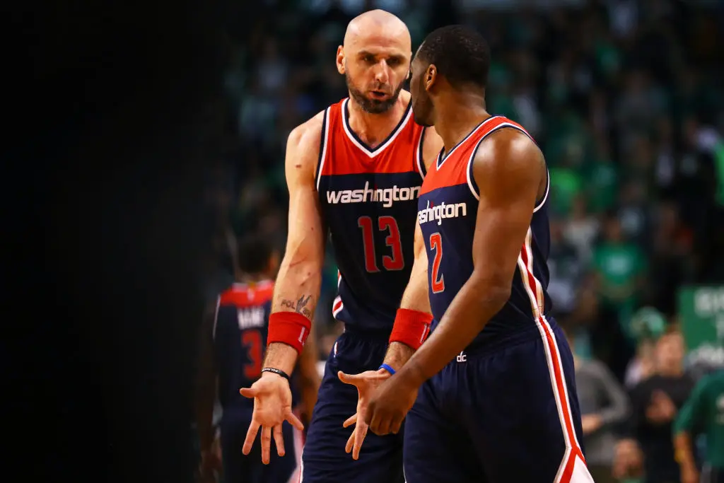 BOSTON, MA - APRIL 30: Marcin Gortat #13 of the Washington Wizards talks with John Wall #2 during the third quarter of Game One of the Eastern Conference Semifinals against the Boston Celtics at TD Garden on April 30, 2017 in Boston, Massachusetts